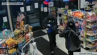 SMP24053628_Surveillance_video_image_of_the_armed_robbery_incident.png