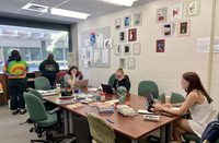 PCC's Alchemy lit magazine staff at work, continuously publishing for 50 years.