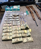 Cash and Firearm Seizure