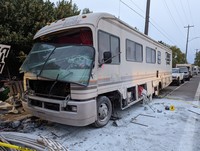 Damaged RV crime scene