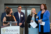 OBA's Lori Kaliher, executive vice president and chief operating officer (left), delivers the induction speech about Linda Navarro's (right) remarkable industry contributions as she is inducted into the Oregon Bankers Hall of Fame. Pictured with Kaliher and Navarro are OBA Chair Ted Austin of U.S. Bank Private Wealth Management and CBO Chair Kate Salyers of Citizens Bank.
