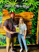 Joy Hudson, CEO and co-founder of Nimble (left), and Tony Fritts, Regional Manager of Cannabis Nation (right) at Blooming Deals by Cannabis Nation in Beaverton, the first retail shop in Oregon to carry Joy Bombs.