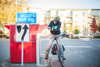 Cyclist_Putting_Ballot_into_Box.jpg