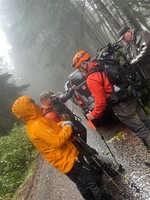 Search and Rescue Volunteers debrief after locating Greer on Wednesday