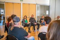 City councilors participate in small group conversation at a Council Community Forum