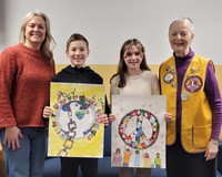 (L-R Art Teacher, Mrs. Wendy Hinderhofer, Brock Durrett, Lucy Eder, and LOLC and District 36-O Peace Poster Contest Chair, Bonnie Roeder.