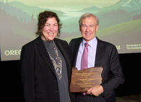 Oregon Bankers Hall of Fame inductee Randy Compton pictured with retired OBA President and CEO Linda Navarro who presented his induction.